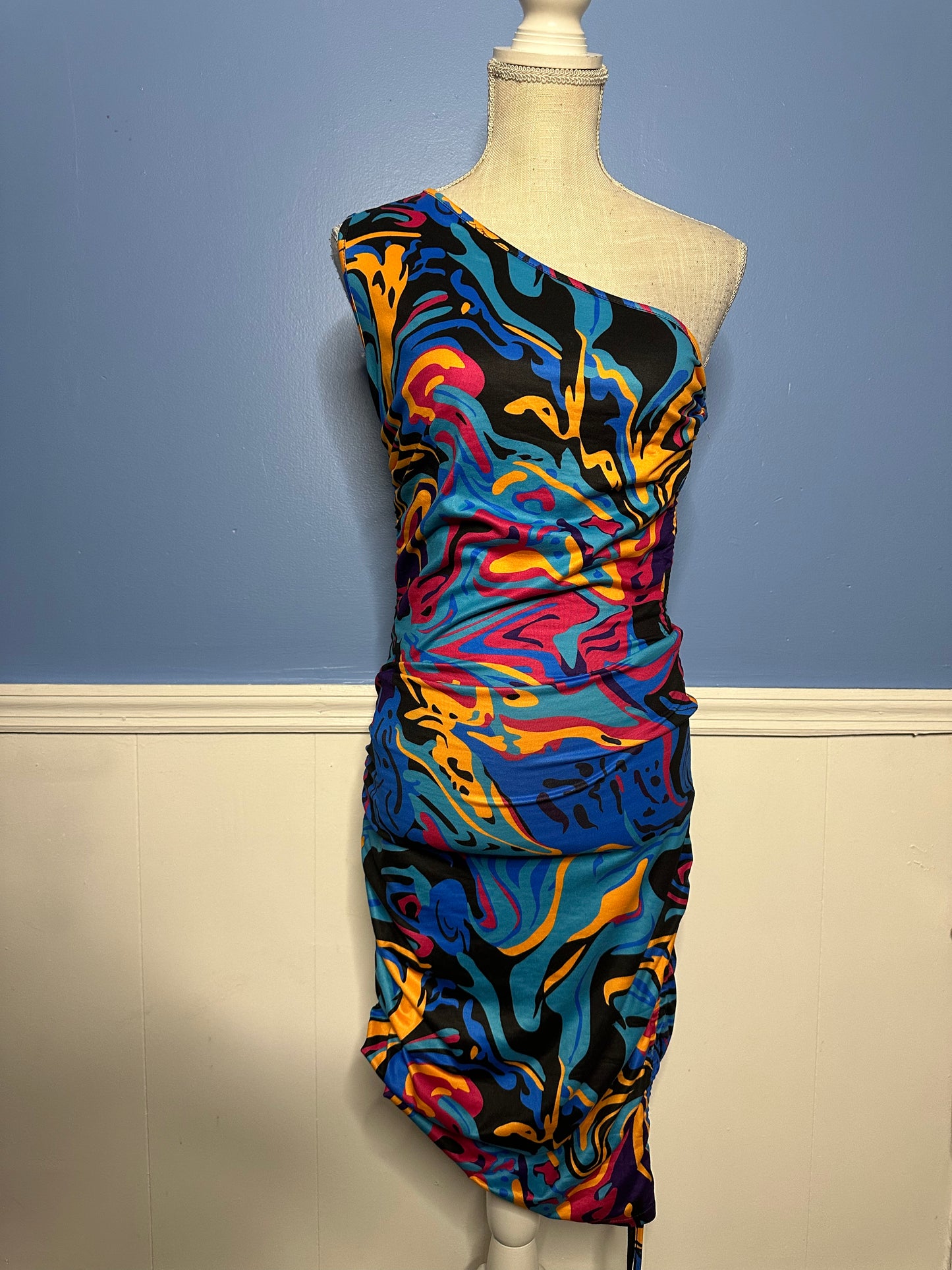 One shoulder multi color dress gathering on side 
Sz: large w/ stretch